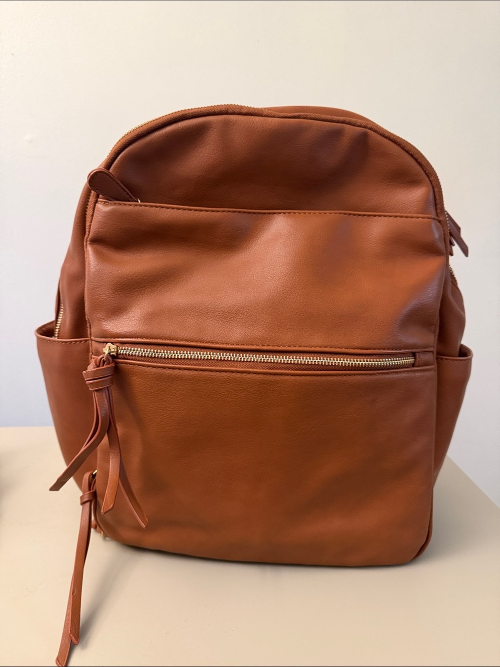 Diaper Backpack Tan Soft Faux Leather with many pockets and insulation